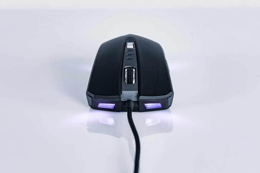Close-up of a sleek, wired gaming mouse with LED lighting. Perfect for tech and gaming needs.